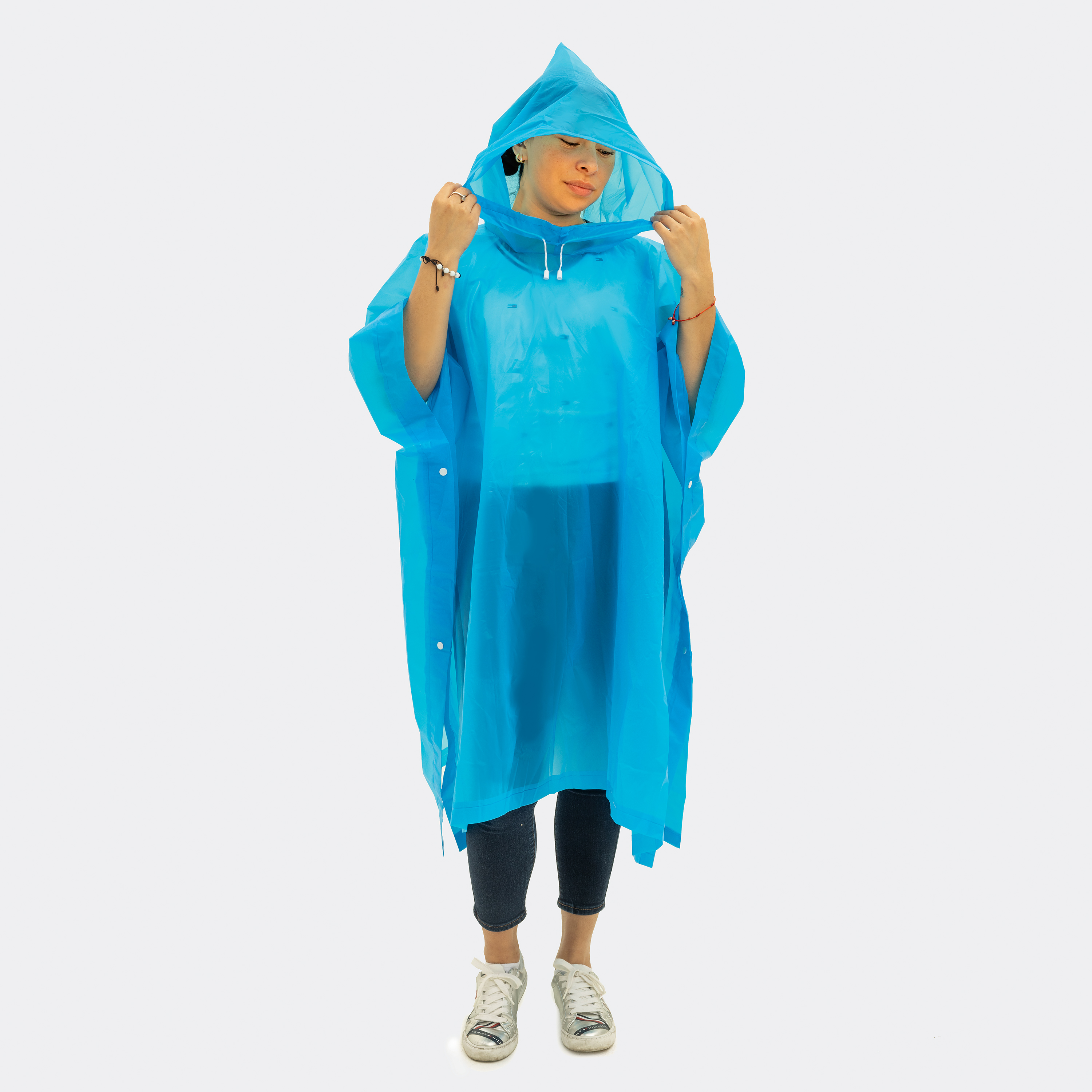 french police rain poncho with carrying bag Arcturus Waterproof This compact poncho is extremely portable and features an attached hood for extra rain protection Coghlan's Green Rain Poncho